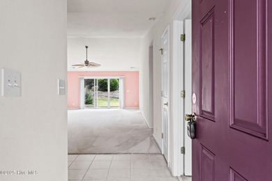 Now available is this wonderful one level ranch style home in on Sandpiper Bay Golf and Country Club in North Carolina - for sale on GolfHomes.com, golf home, golf lot