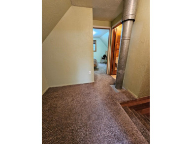 Cute as a button cabin in a great in town location! This 3 on McCall Municipal Golf Course in Idaho - for sale on GolfHomes.com, golf home, golf lot