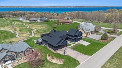 Private Luxury Estate with Panoramic Bay Views in Gated on Lochen Heath Golf Course in Michigan - for sale on GolfHomes.com, golf home, golf lot