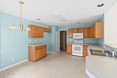 Now available is this wonderful one level ranch style home in on Sandpiper Bay Golf and Country Club in North Carolina - for sale on GolfHomes.com, golf home, golf lot