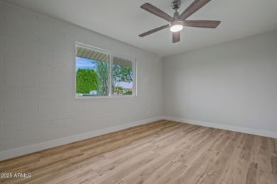 Welcome to a beautifully updated home just minutes from the on  in Arizona - for sale on GolfHomes.com, golf home, golf lot