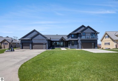 Private Luxury Estate with Panoramic Bay Views in Gated on Lochen Heath Golf Course in Michigan - for sale on GolfHomes.com, golf home, golf lot