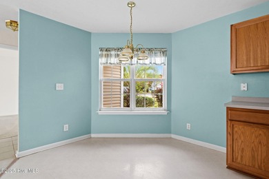 Now available is this wonderful one level ranch style home in on Sandpiper Bay Golf and Country Club in North Carolina - for sale on GolfHomes.com, golf home, golf lot