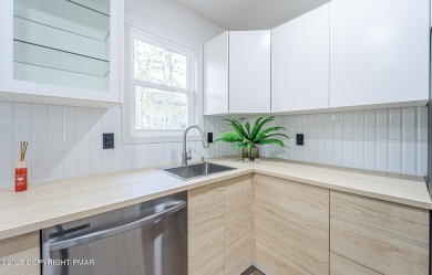 ULTRA MODERN MINIMALISTIC CAPE COD Completely Renovated w/ Clean on Pocono Farms Country Club in Pennsylvania - for sale on GolfHomes.com, golf home, golf lot