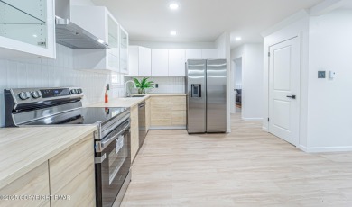 ULTRA MODERN MINIMALISTIC CAPE COD Completely Renovated w/ Clean on Pocono Farms Country Club in Pennsylvania - for sale on GolfHomes.com, golf home, golf lot
