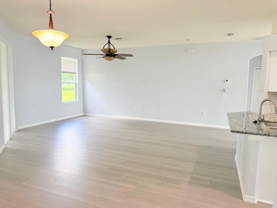 LOCATION AND MORE.   This is a gorgeous and renovated one single on Oaks National Golf Course in Florida - for sale on GolfHomes.com, golf home, golf lot