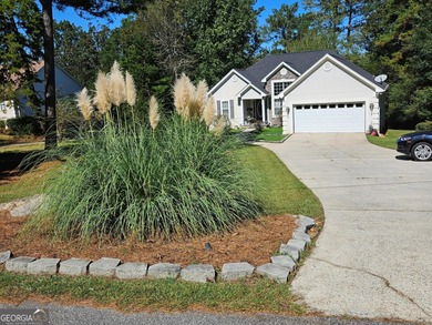 Vacation at your home with separate dining and living room 3 on Fairfield Plantation Golf and Country Club in Georgia - for sale on GolfHomes.com, golf home, golf lot