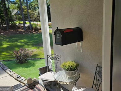 Vacation at your home with separate dining and living room 3 on Fairfield Plantation Golf and Country Club in Georgia - for sale on GolfHomes.com, golf home, golf lot