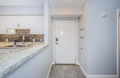 NEW HURRICANE WINDOWS  SLIDING DOOR on this unit!!! Discover the on Hunters Green Country Club in Florida - for sale on GolfHomes.com, golf home, golf lot