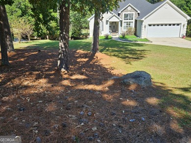 Vacation at your home with separate dining and living room 3 on Fairfield Plantation Golf and Country Club in Georgia - for sale on GolfHomes.com, golf home, golf lot