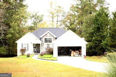Vacation at your home with separate dining and living room 3 on Fairfield Plantation Golf and Country Club in Georgia - for sale on GolfHomes.com, golf home, golf lot