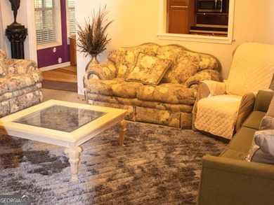 Vacation at your home with separate dining and living room 3 on Fairfield Plantation Golf and Country Club in Georgia - for sale on GolfHomes.com, golf home, golf lot