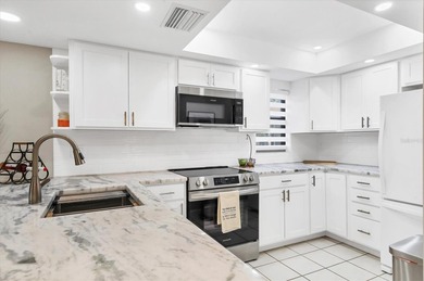 Enjoy a relaxed Florida lifestyle in this one bedroom, one bath on The Meadows Golf and Country Club in Florida - for sale on GolfHomes.com, golf home, golf lot