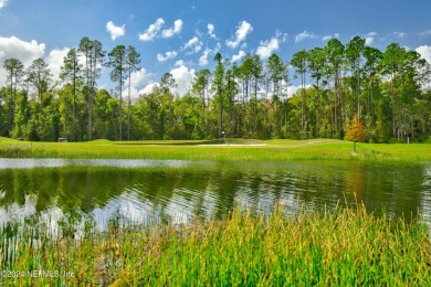 CALLING ALL GOLFERS!! Stunning Home w Water Views in the Highly on Cimarrone Golf and Country Club in Florida - for sale on GolfHomes.com, golf home, golf lot