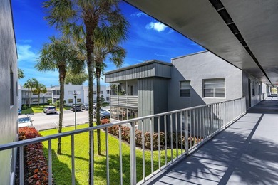 Second-floor 2 bed / 2 bath condo with garden views in the on Kings Point Golf -Flanders Way in Florida - for sale on GolfHomes.com, golf home, golf lot