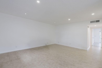 Second-floor 2 bed / 2 bath condo with garden views in the on Kings Point Golf -Flanders Way in Florida - for sale on GolfHomes.com, golf home, golf lot