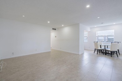 Second-floor 2 bed / 2 bath condo with garden views in the on Kings Point Golf -Flanders Way in Florida - for sale on GolfHomes.com, golf home, golf lot