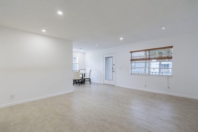 Second-floor 2 bed / 2 bath condo with garden views in the on Kings Point Golf -Flanders Way in Florida - for sale on GolfHomes.com, golf home, golf lot