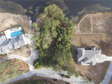 This beautiful waterfront property is located inside of the on Anderson Creek Golf Club in North Carolina - for sale on GolfHomes.com, golf home, golf lot