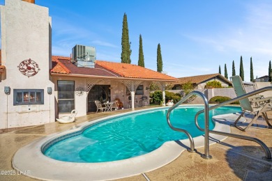 This spacious Southwest-style custom pool home is perfect for on Cerbat Cliffs Golf Course in Arizona - for sale on GolfHomes.com, golf home, golf lot