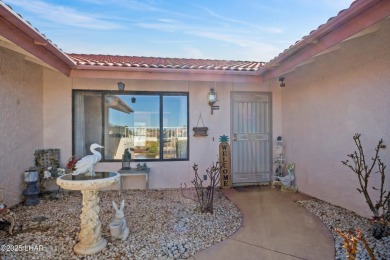 This spacious Southwest-style custom pool home is perfect for on Cerbat Cliffs Golf Course in Arizona - for sale on GolfHomes.com, golf home, golf lot