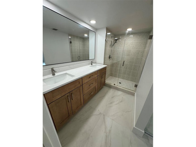 Newly renovated and move-in ready. This spacious 2-bedroom, 2 on Pine Island Ridge Country Club in Florida - for sale on GolfHomes.com, golf home, golf lot