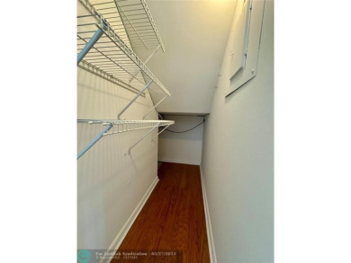 Move-in ready in the heart of Davie close to highways on Pine Island Ridge Country Club in Florida - for sale on GolfHomes.com, golf home, golf lot