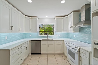 BRAND NEW ROOF!! RENOVATED KITCHEN!! Owner moved and needs to on Martin Downs Country Club in Florida - for sale on GolfHomes.com, golf home, golf lot