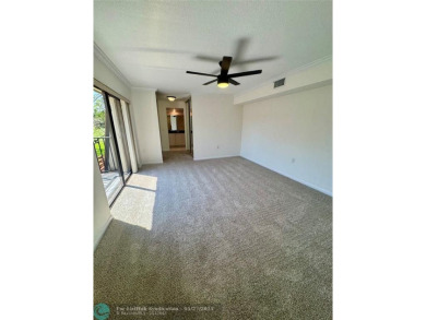 Move-in ready in the heart of Davie close to highways on Pine Island Ridge Country Club in Florida - for sale on GolfHomes.com, golf home, golf lot