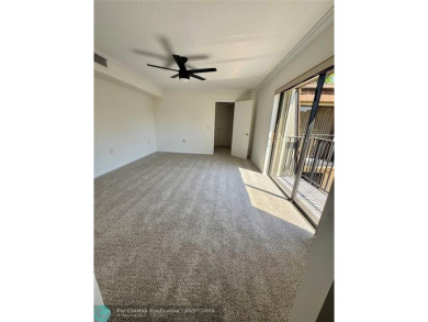 Move-in ready in the heart of Davie close to highways on Pine Island Ridge Country Club in Florida - for sale on GolfHomes.com, golf home, golf lot