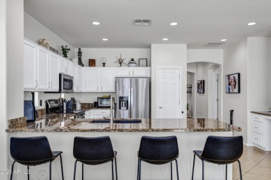 Inviting single-story with 3 beds, 2 baths, open kitchen with on Seville Golf and Country Club in Arizona - for sale on GolfHomes.com, golf home, golf lot