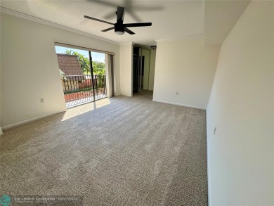 Move-in ready in the heart of Davie close to highways on Pine Island Ridge Country Club in Florida - for sale on GolfHomes.com, golf home, golf lot