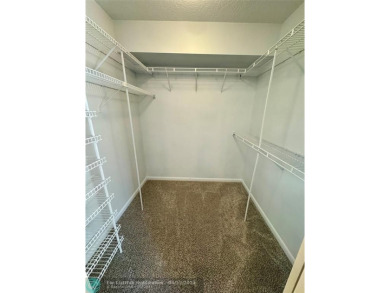 Move-in ready in the heart of Davie close to highways on Pine Island Ridge Country Club in Florida - for sale on GolfHomes.com, golf home, golf lot