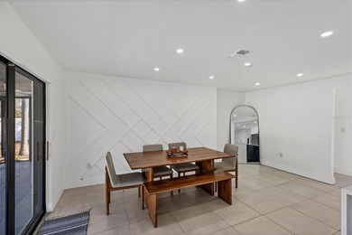 Welcome to this beautifully updated 3-bedroom, 3-bath home on Bent Tree Country Club in Florida - for sale on GolfHomes.com, golf home, golf lot