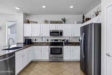 Inviting single-story with 3 beds, 2 baths, open kitchen with on Seville Golf and Country Club in Arizona - for sale on GolfHomes.com, golf home, golf lot