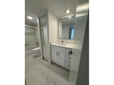 Newly renovated and move-in ready. This spacious 2-bedroom, 2 on Pine Island Ridge Country Club in Florida - for sale on GolfHomes.com, golf home, golf lot