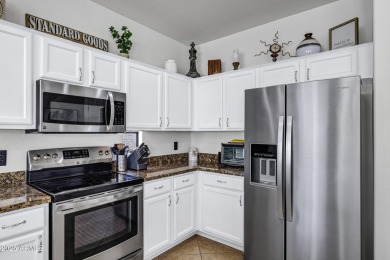 Inviting single-story with 3 beds, 2 baths, open kitchen with on Seville Golf and Country Club in Arizona - for sale on GolfHomes.com, golf home, golf lot