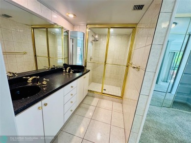 Move-in ready in the heart of Davie close to highways on Pine Island Ridge Country Club in Florida - for sale on GolfHomes.com, golf home, golf lot