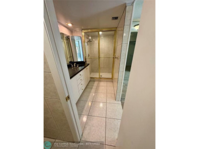 Move-in ready in the heart of Davie close to highways on Pine Island Ridge Country Club in Florida - for sale on GolfHomes.com, golf home, golf lot