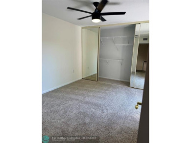 Move-in ready in the heart of Davie close to highways on Pine Island Ridge Country Club in Florida - for sale on GolfHomes.com, golf home, golf lot