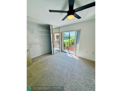 Move-in ready in the heart of Davie close to highways on Pine Island Ridge Country Club in Florida - for sale on GolfHomes.com, golf home, golf lot