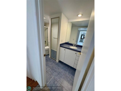 Move-in ready in the heart of Davie close to highways on Pine Island Ridge Country Club in Florida - for sale on GolfHomes.com, golf home, golf lot