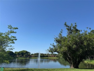 Move-in ready in the heart of Davie close to highways on Pine Island Ridge Country Club in Florida - for sale on GolfHomes.com, golf home, golf lot