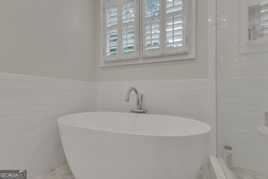 Warning!! This home may cause sudden daydreams of front porch on Whitewater Creek in Georgia - for sale on GolfHomes.com, golf home, golf lot