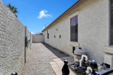 Inviting single-story with 3 beds, 2 baths, open kitchen with on Seville Golf and Country Club in Arizona - for sale on GolfHomes.com, golf home, golf lot