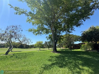 Move-in ready in the heart of Davie close to highways on Pine Island Ridge Country Club in Florida - for sale on GolfHomes.com, golf home, golf lot