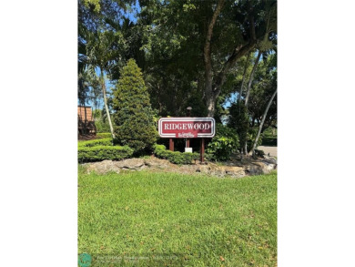 Move-in ready in the heart of Davie close to highways on Pine Island Ridge Country Club in Florida - for sale on GolfHomes.com, golf home, golf lot