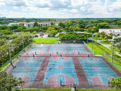 Across the street from Central Park and completely renovated on Jacaranda Golf Club in Florida - for sale on GolfHomes.com, golf home, golf lot