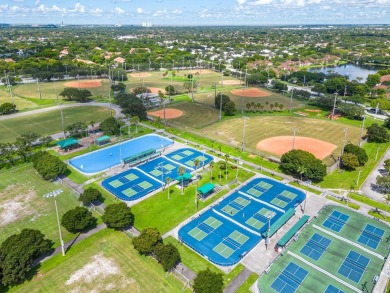 Across the street from Central Park and completely renovated on Jacaranda Golf Club in Florida - for sale on GolfHomes.com, golf home, golf lot