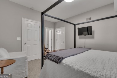 Warning!! This home may cause sudden daydreams of front porch on Whitewater Creek in Georgia - for sale on GolfHomes.com, golf home, golf lot